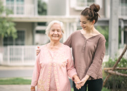 caregiver assisting elderly