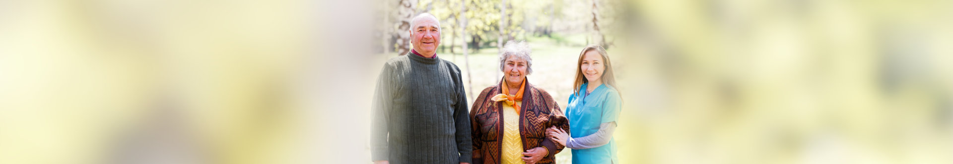senior patients and caregiver smiling